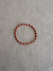 Gold Bead Bracelet with Red Coral Accents