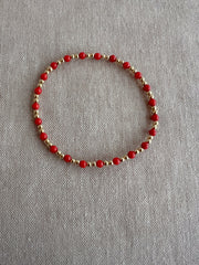 Gold Bead Bracelet with Red Coral Accents