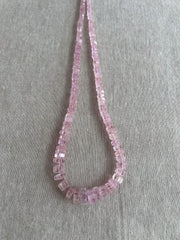 Strand of natural untreated Pink Morganite faceted bolt beads, graduated from 4.5mm to 10mm, for handmade jewelry designs.