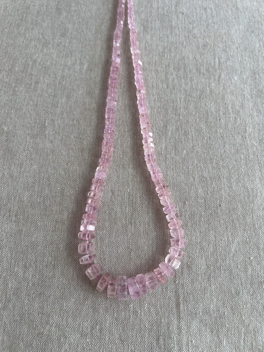 Strand of natural untreated Pink Morganite faceted bolt beads, graduated from 4.5mm to 10mm, for handmade jewelry designs.