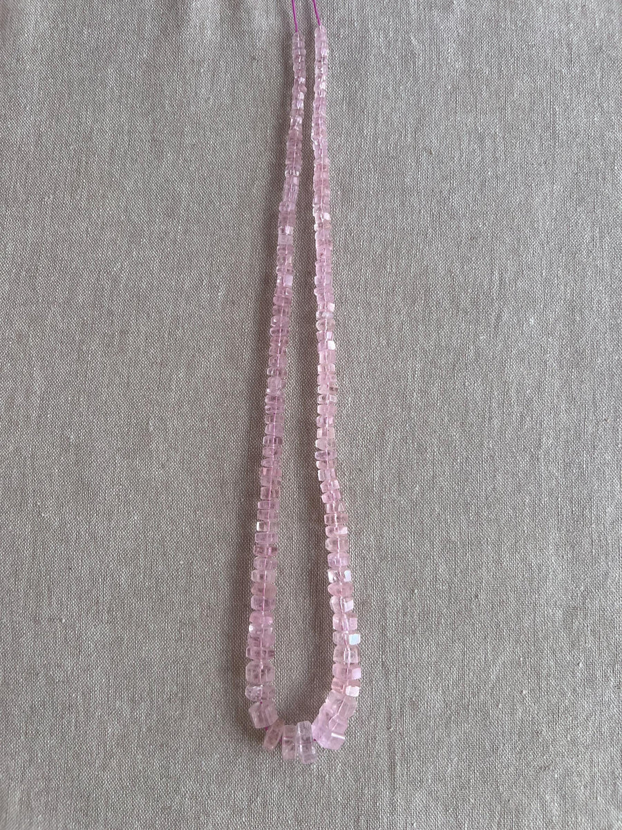Strand of natural untreated Pink Morganite faceted bolt beads, graduated from 4.5mm to 10mm, for handmade jewelry designs.