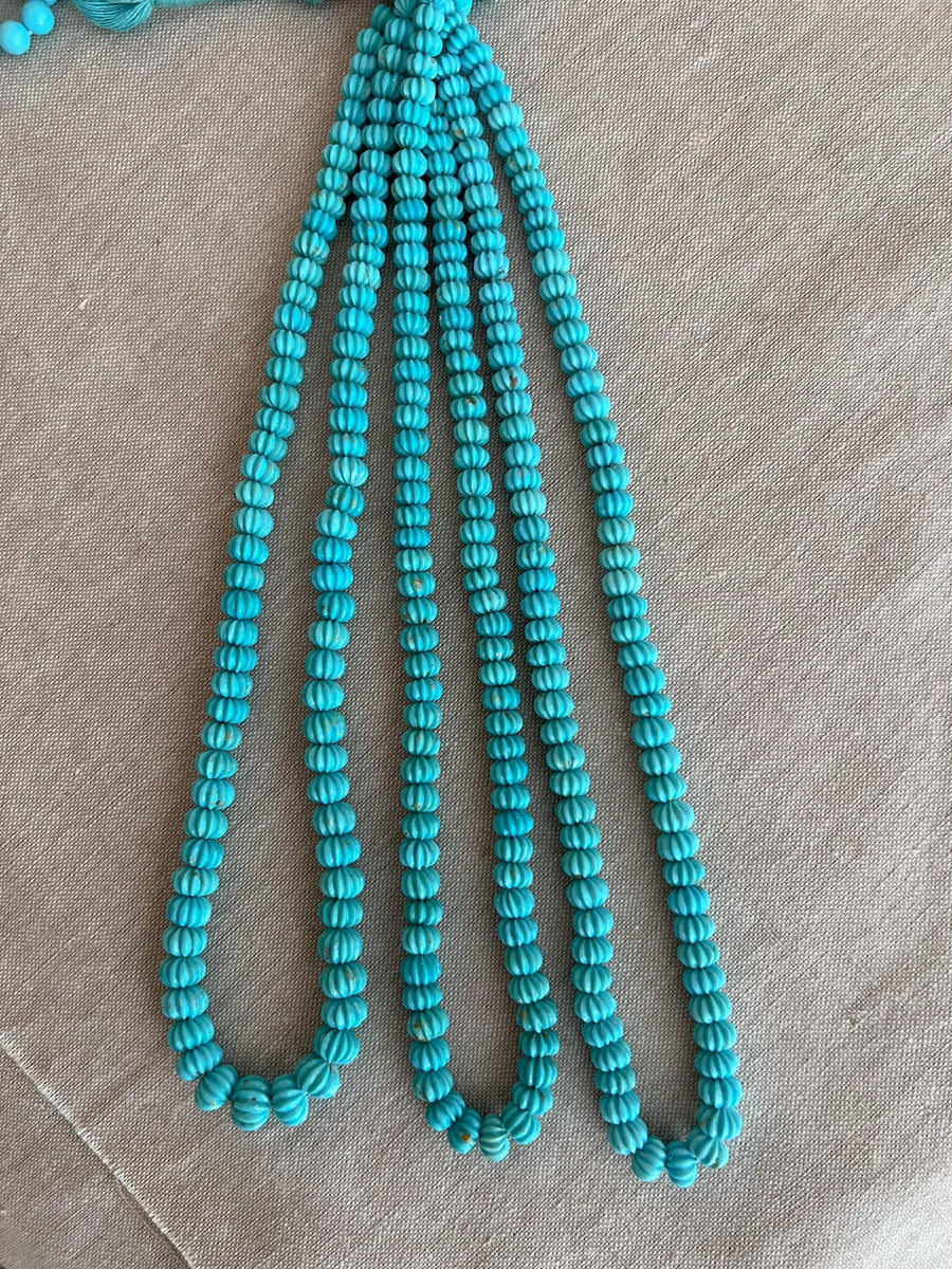 16-inch strand of AA+ Sleeping Beauty Turquoise carved melon gemstone beads from Arizona, graduated in size for jewelry making. multiple strands
