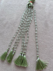 Strand of AA+ Prasiolite faceted cylinder gemstone beads from Brazil, graduated from 6x10mm to 7x12mm for jewelry making. multiple strands