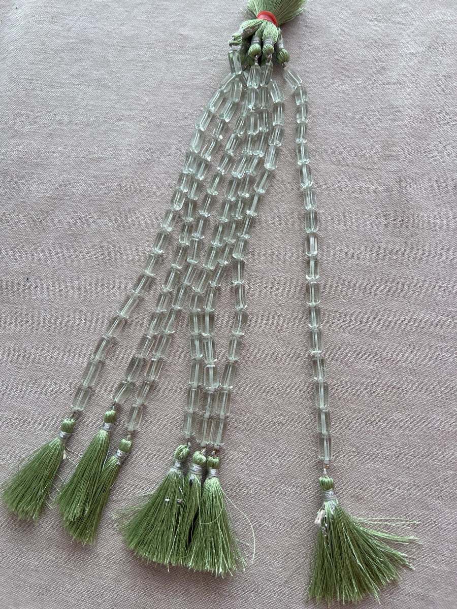 Strand of AA+ Prasiolite faceted cylinder gemstone beads from Brazil, graduated from 6x10mm to 7x12mm for jewelry making. multiple strands