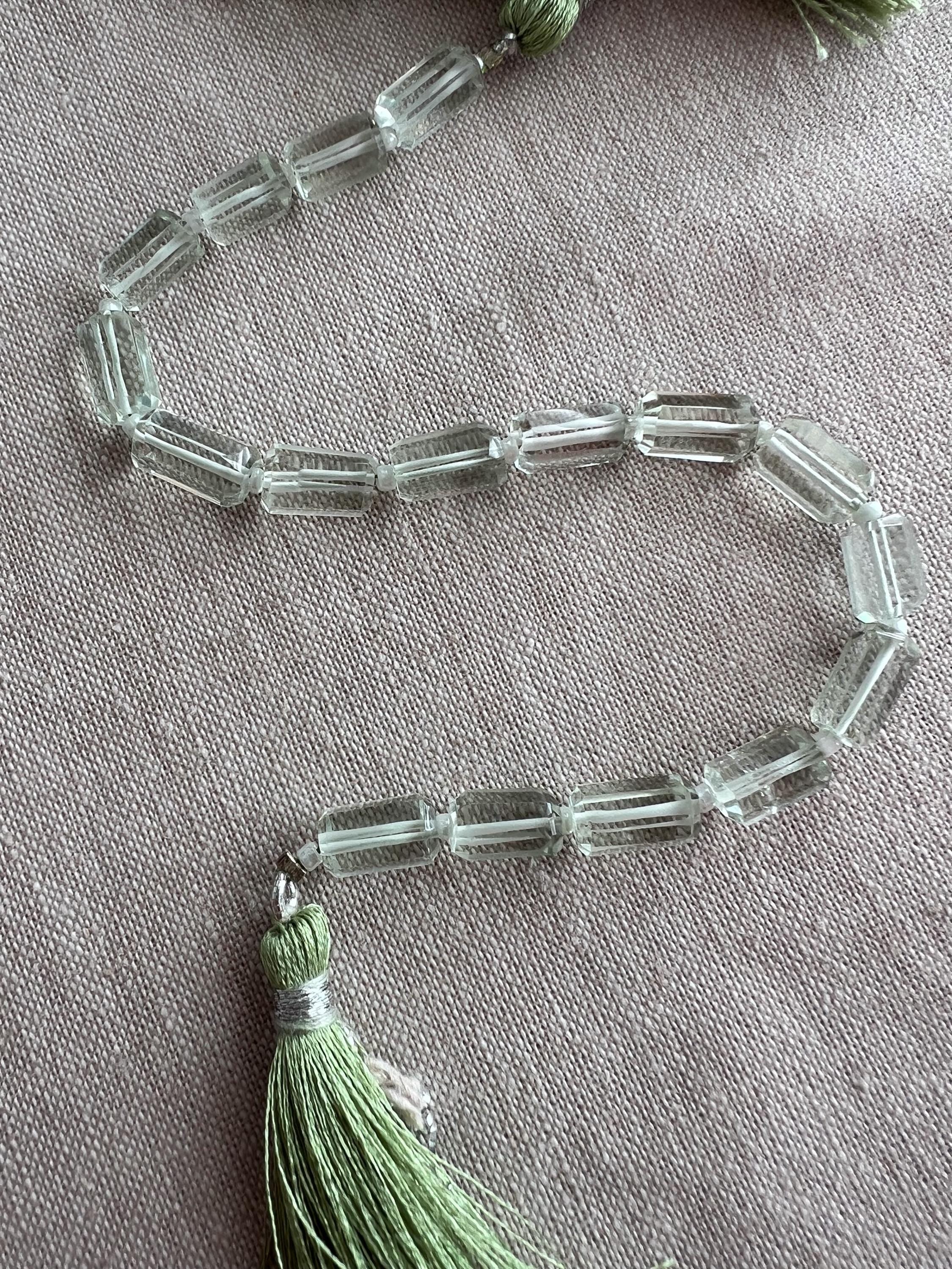 AA+ Brazilian Prasiolite faceted cylinder beads, transparent mint green amethyst gemstones graduated from 6x10mm to 7x12mm.