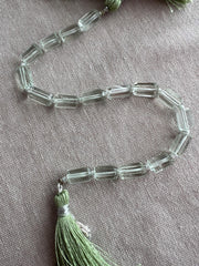 AA+ Brazilian Prasiolite faceted cylinder beads, transparent mint green amethyst gemstones graduated from 6x10mm to 7x12mm.