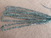 AA+ natural Brazilian Aquamarine faceted cylinder beads, transparent pale blue gemstones graduated from 3x5mm to 6x9mm. multiple strands