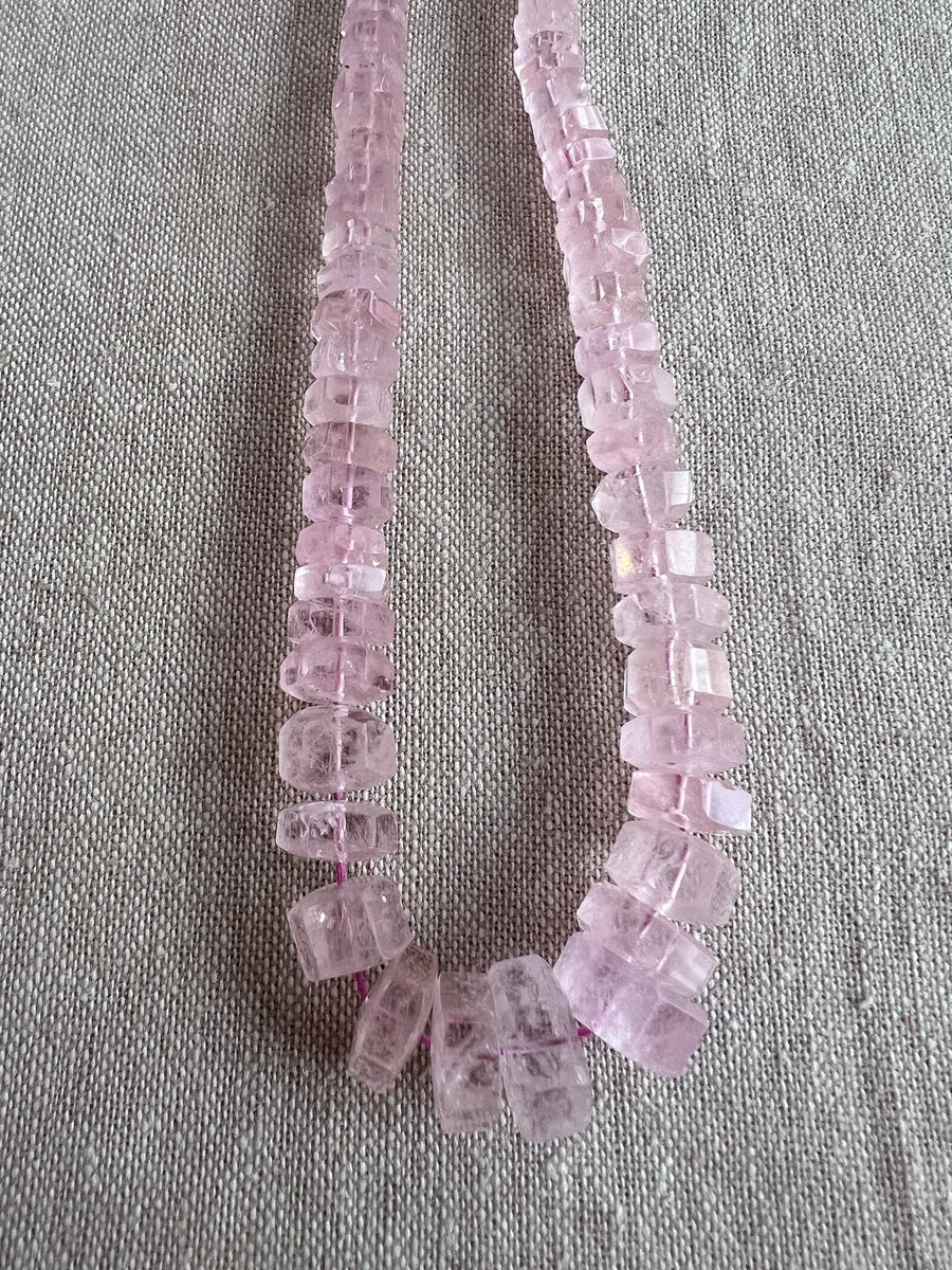 Brazilian Pink Morganite faceted cylinder and bolt-shaped beads featuring rich pink tones, translucent clarity, and polished facets.