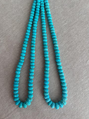 16-inch strand of AA+ Arizona Sleeping Beauty Turquoise carved melon beads, graduated from 5.5mm to 9mm for jewelry making.