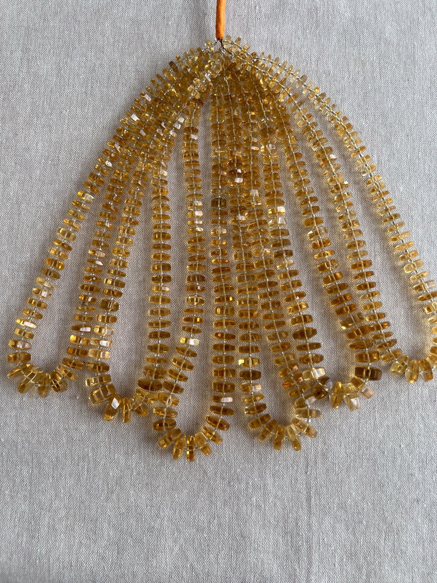16-inch strand of AAA Brazilian Citrine faceted bolt beads, approximately 80 gemstones graduated from 6mm to 13mm.  multiple strands