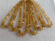 16-inch strand of AAA Brazilian Citrine faceted bolt beads, approximately 80 gemstones graduated from 6mm to 13mm. multiple strands