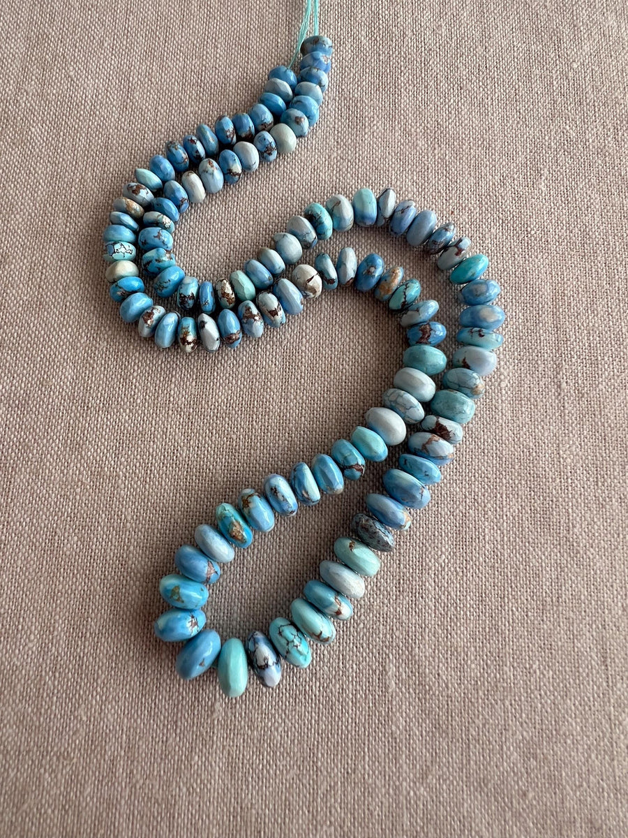 15-inch strand of AAA Golden Hills Turquoise smooth rondelle beads from Kazakhstan, graduated from 4mm to 7.5mm for jewelry making.