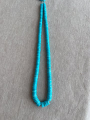 Strand of AAA Sleeping Beauty Turquoise faceted heishi gemstone beads, graduated from 5.5mm to 9mm for fine jewelry making.