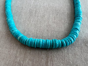 Natural untreated Arizona Sleeping Beauty Turquoise beads with distinctive faceted heishi cuts and classic medium blue color. close up detail shot