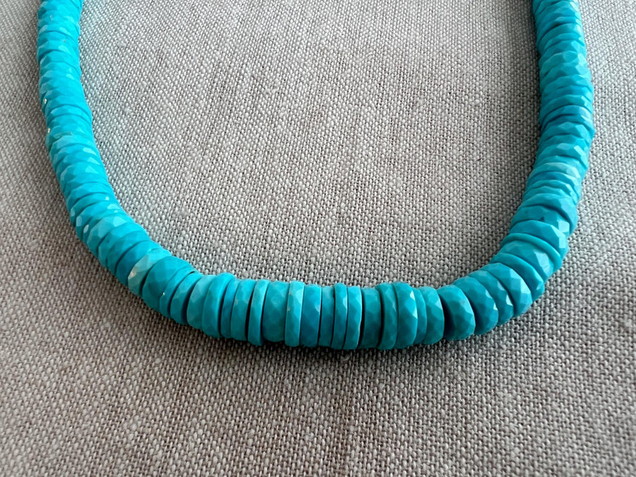 Natural untreated Arizona Sleeping Beauty Turquoise beads with distinctive faceted heishi cuts and classic medium blue color. close up detail shot