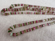 Strand of natural untreated Tourmaline faceted bolt beads in graduated sizes, ideal for fine jewelry making.