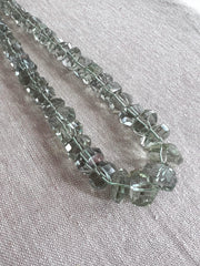 AAA Indian Prasiolite twisted rondelle beads, transparent green amethyst gemstones graduated from 7mm to 13mm for jewelry making.