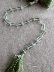 Strand of AA+ Prasiolite faceted cylinder gemstone beads from Brazil, graduated from 6x10mm to 7x12mm for jewelry making. single strand, green beads