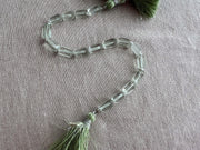 Strand of AA+ Prasiolite faceted cylinder gemstone beads from Brazil, graduated from 6x10mm to 7x12mm for jewelry making. single strand