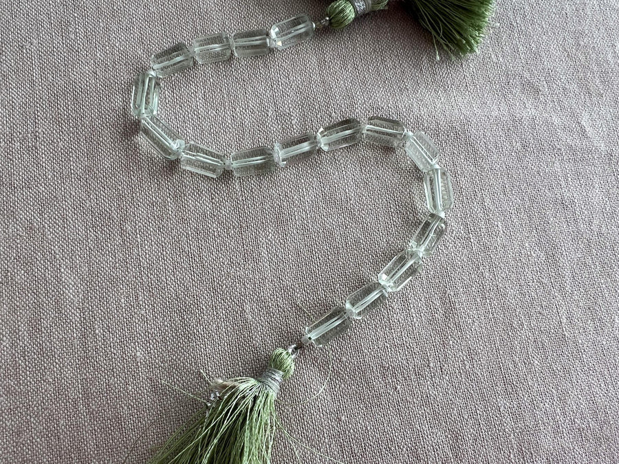 Strand of AA+ Prasiolite faceted cylinder gemstone beads from Brazil, graduated from 6x10mm to 7x12mm for jewelry making. single strand