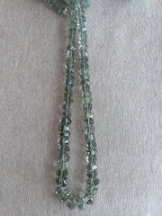 16-inch strand of AAA Indian Prasiolite twisted rondelle beads, graduated from 7mm to 13mm, for fine jewelry making.
