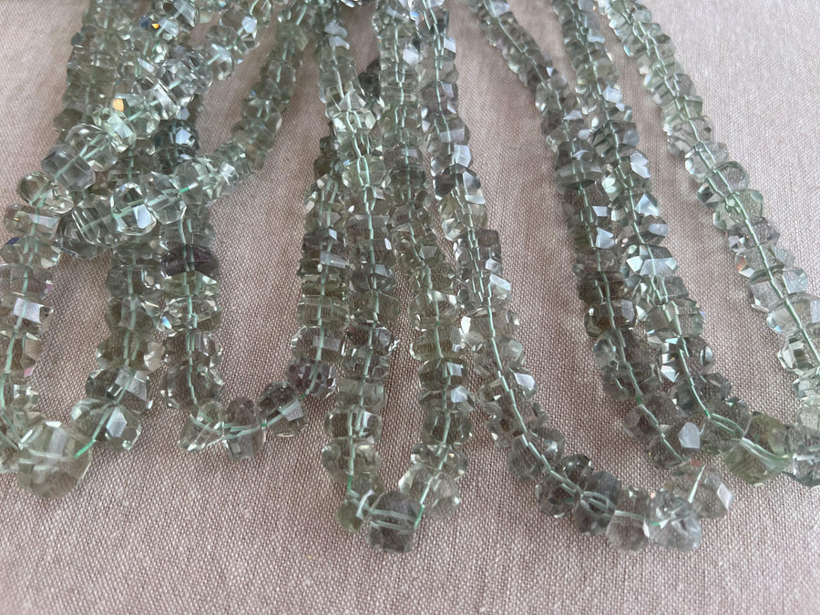 AAA Indian Prasiolite twisted rondelle beads, transparent green amethyst gemstones graduated from 7mm to 13mm for jewelry making. multiple. strands