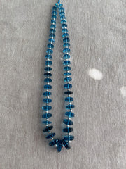 14-inch strand of Swiss Blue Topaz faceted bolt beads, 50 graduated gemstones weighing approximately 206 carats.
