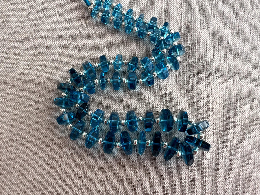 AAA+ Swiss Blue Topaz faceted bolt beads, brilliant blue transparent gemstones graduated from 6mm to 11mm for jewelry making.