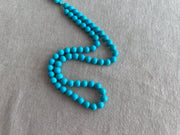 16-inch strand of AAA+ Sleeping Beauty Turquoise smooth round 7mm beads from Arizona for fine jewelry making.
