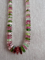 AAA natural Tourmaline bolt cut gemstone beads featuring soft pink, medium pink, and light to dark green tones.