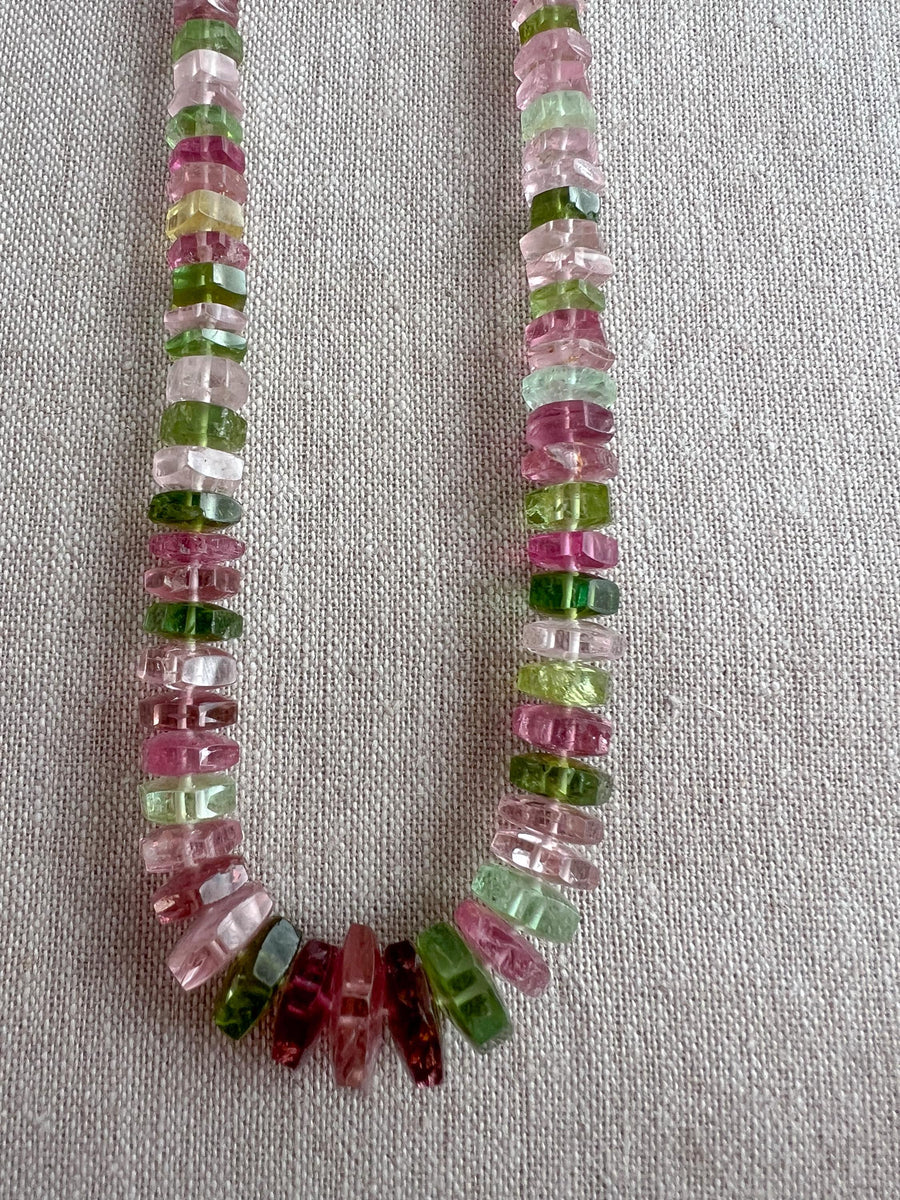 AAA natural Tourmaline bolt cut gemstone beads featuring soft pink, medium pink, and light to dark green tones.