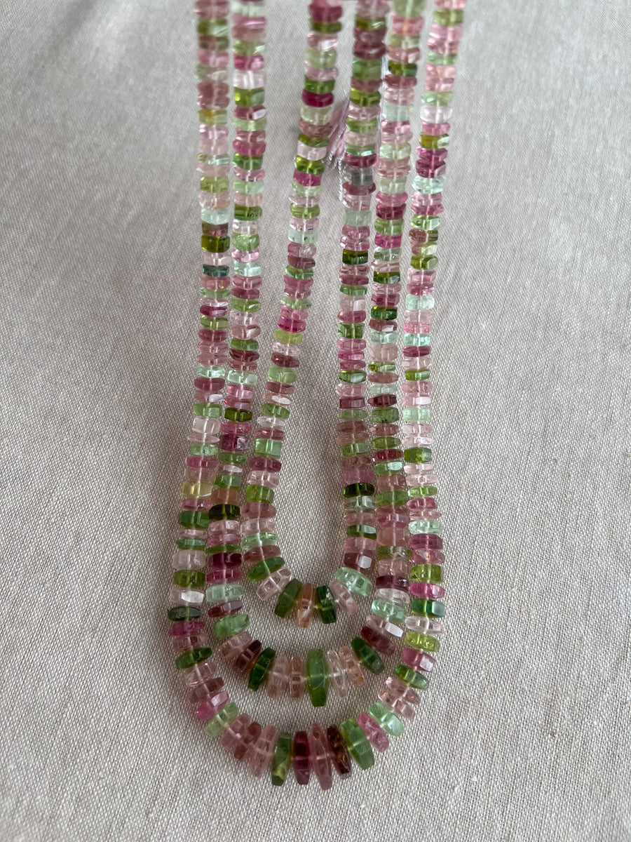 Strand of natural untreated Tourmaline faceted bolt beads in graduated sizes, ideal for fine jewelry making. three strands