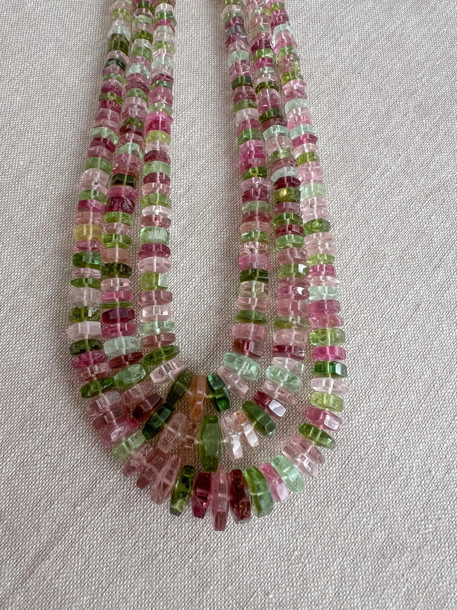AAA natural Tourmaline bolt cut gemstone beads featuring soft pink, medium pink, and light to dark green tones.