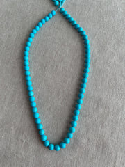 16-inch strand of AAA+ Sleeping Beauty Turquoise smooth round 7mm beads from Arizona for fine jewelry making.