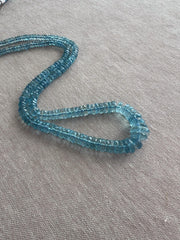 Strand of natural Santa Maria Aquamarine faceted tyre beads, graduated from 4mm to 9.5mm, for jewelry making.