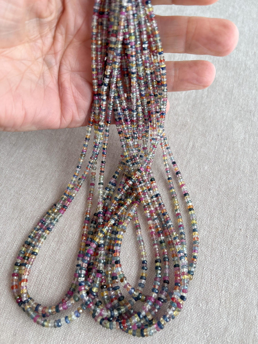 16-inch strand of natural unheated Sapphire faceted rondelle beads in assorted colors, graduated from 2.5mm to 4mm. multiple strands, multicolor gemstones