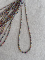16-inch strand of natural unheated Sapphire faceted rondelle beads in assorted colors, graduated from 2.5mm to 4mm.