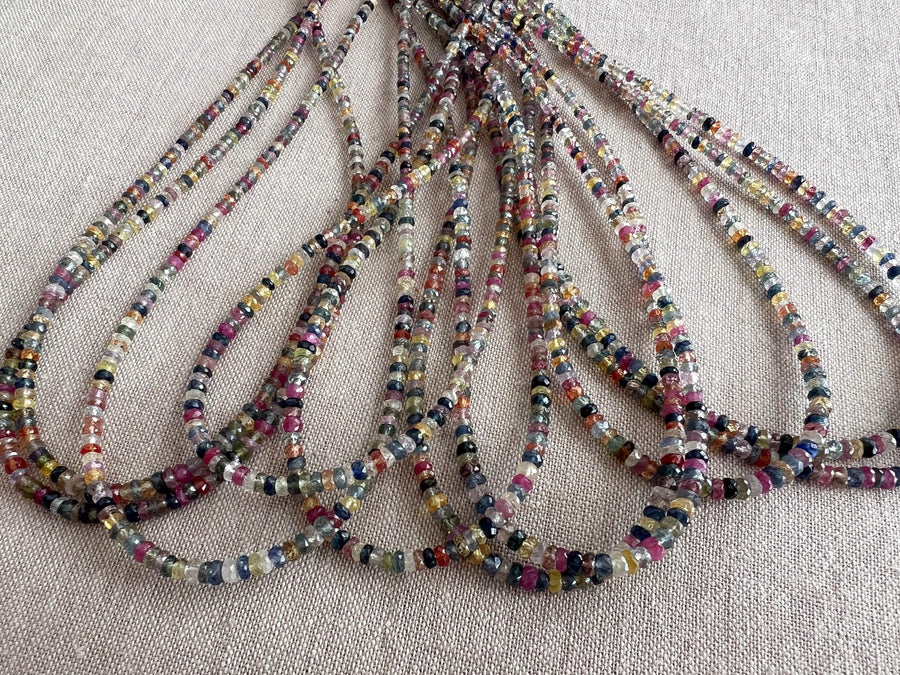 16-inch strand of natural unheated Sapphire faceted rondelle beads in assorted colors, graduated from 2.5mm to 4mm. multicolor gemstones