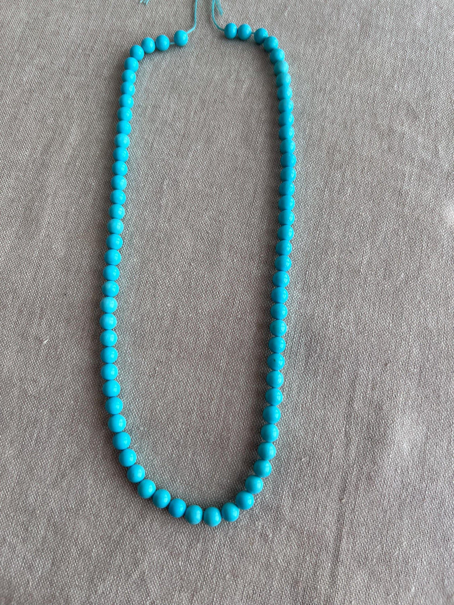 16-inch strand of AAA+ Sleeping Beauty Turquoise smooth round gemstone beads for fine jewelry making.