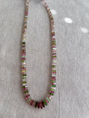 Strand of natural untreated Tourmaline faceted bolt beads in graduated sizes, ideal for fine jewelry making.