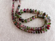 AAA-grade natural bi-color tourmaline smooth rondelle gemstone beads, graduated from 5.5mm to 11mm, featuring beautiful natural color variations for jewelry making.