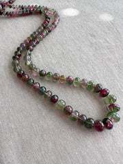 AAA-grade natural bi-color tourmaline smooth rondelle gemstone beads, graduated from 5.5mm to 11mm, featuring beautiful natural color variations for jewelry making. full strand