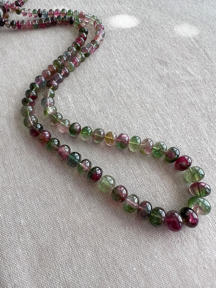 AAA-grade natural bi-color tourmaline smooth rondelle gemstone beads, graduated from 5.5mm to 11mm, featuring beautiful natural color variations for jewelry making. full strand