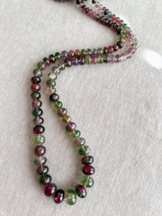AAA-grade natural bi-color tourmaline smooth rondelle gemstone beads, graduated from 5.5mm to 11mm, featuring beautiful natural color variations for jewelry making. full strand