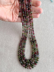 AAA-grade natural bi-color tourmaline smooth rondelle gemstone beads, graduated from 5.5mm to 11mm, featuring beautiful natural color variations for jewelry making. 3 strands