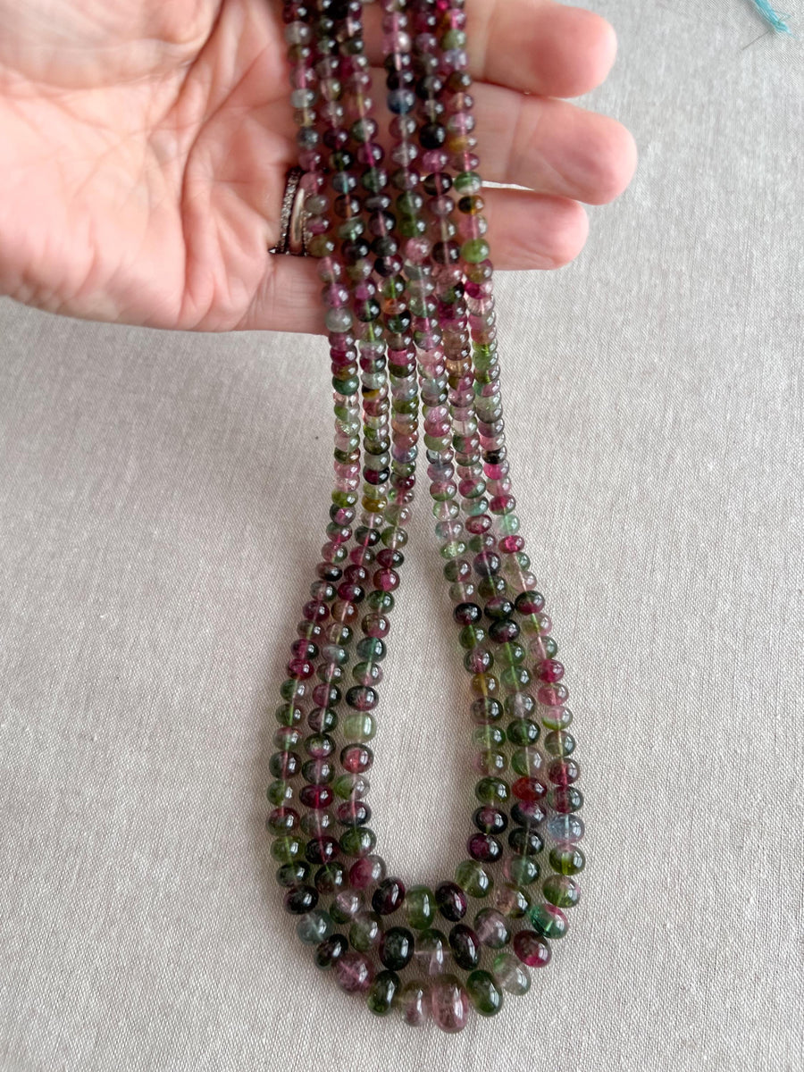 AAA-grade natural bi-color tourmaline smooth rondelle gemstone beads, graduated from 5.5mm to 11mm, featuring beautiful natural color variations for jewelry making. 3 strands