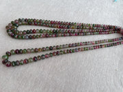 AAA-grade natural bi-color tourmaline smooth rondelle gemstone beads, graduated from 5.5mm to 11mm, featuring beautiful natural color variations for jewelry making. full strand