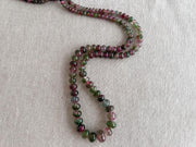 AAA-grade natural bi-color tourmaline smooth rondelle gemstone beads, graduated from 5.5mm to 11mm, featuring beautiful natural color variations for jewelry making. full strand