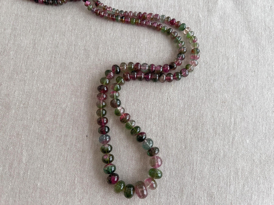 AAA-grade natural bi-color tourmaline smooth rondelle gemstone beads, graduated from 5.5mm to 11mm, featuring beautiful natural color variations for jewelry making. full strand