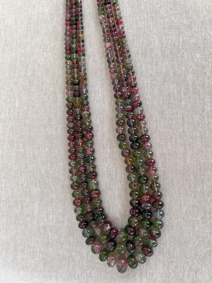 AAA-grade natural bi-color tourmaline smooth rondelle gemstone beads, graduated from 5.5mm to 11mm, featuring beautiful natural color variations for jewelry making. 3 strands
